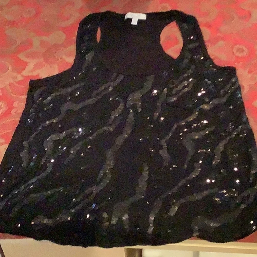 Delia’s small animal print Racer back top, black with sparkles on front
